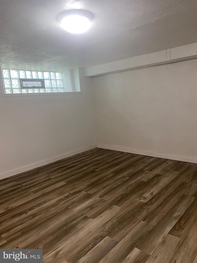1148 Slocum St, Philadelphia, PA 19150 - spare room featuring dark wood-type flooring and baseboards