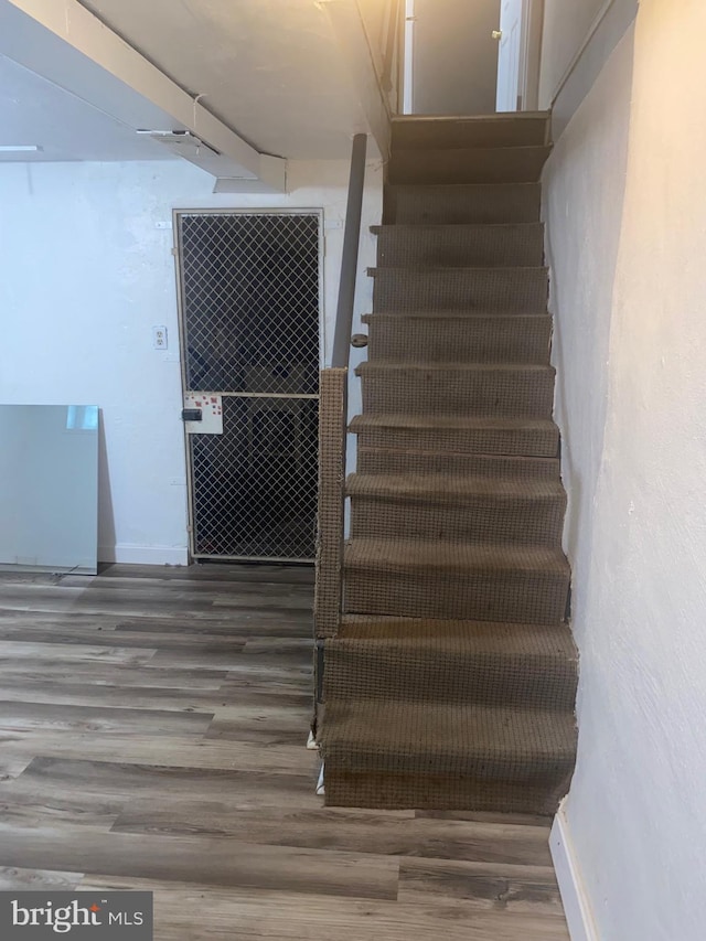 1148 Slocum St, Philadelphia, PA 19150 - stairs with wood finished floors and baseboards