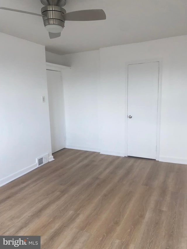 1148 Slocum St, Philadelphia, PA 19150 - unfurnished room with a ceiling fan, wood finished floors, and baseboards