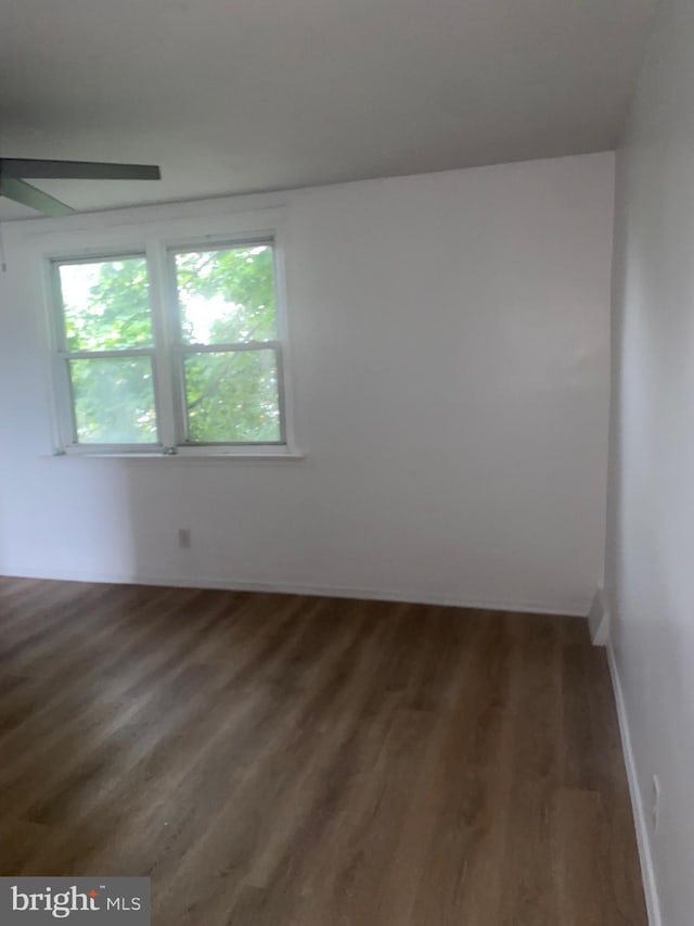 1148 Slocum St, Philadelphia, PA 19150 - unfurnished room featuring wood finished floors, a ceiling fan, and baseboards