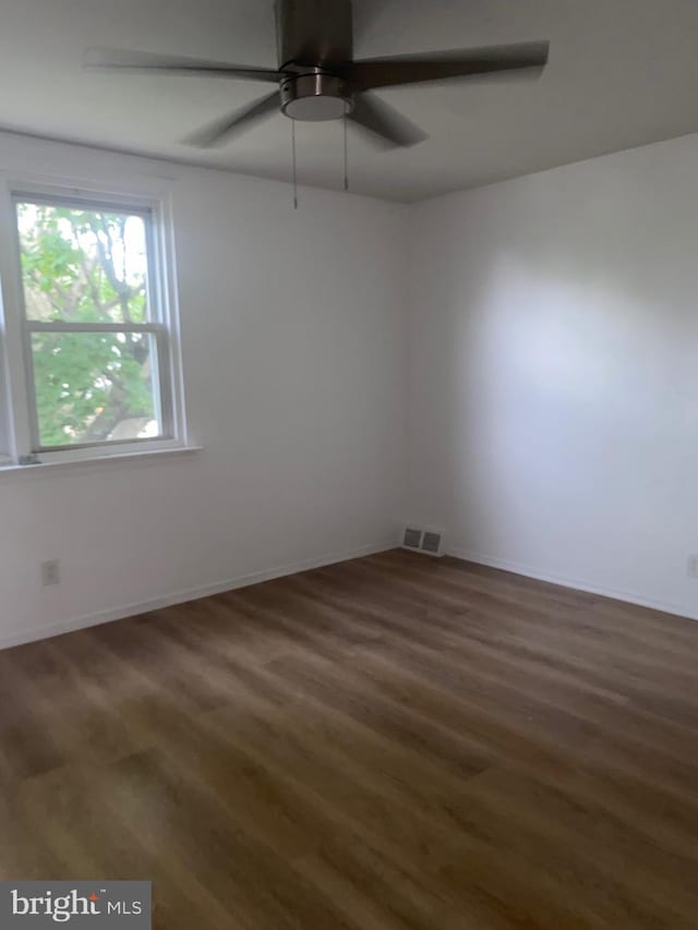 1148 Slocum St, Philadelphia, PA 19150 - empty room featuring wood finished floors, a ceiling fan, and baseboards