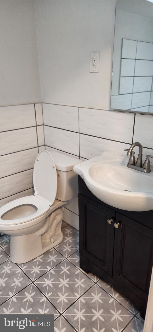 1148 Slocum St, Philadelphia, PA 19150 - half bath featuring toilet, vanity, and tile patterned floors