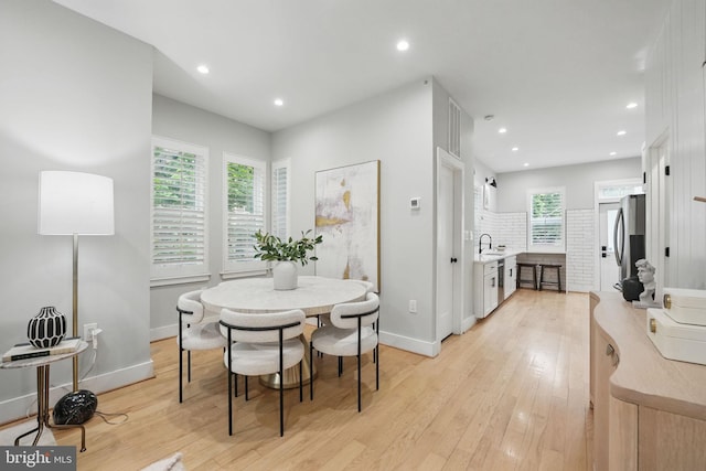 1387 N Carolina Ave NE, Washington, DC 20002 - dining space featuring light wood-style flooring, baseboards, and recessed lighting