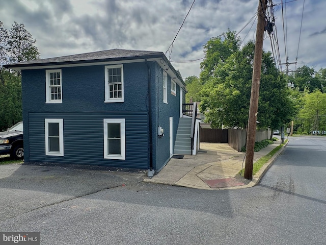 118 Hopewell St, Birdsboro, PA 19508 - view of side of property with stairs and stucco siding