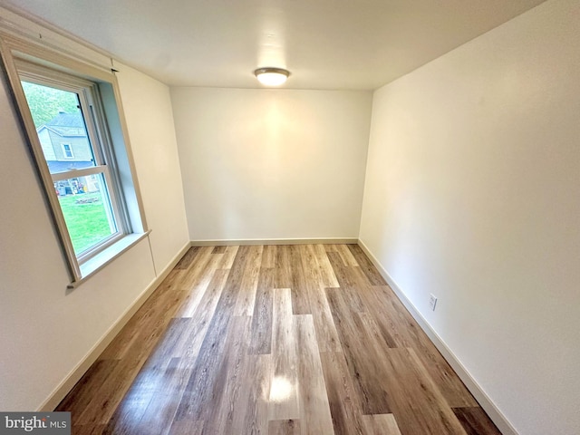 118 Hopewell St, Birdsboro, PA 19508 - empty room with wood finished floors, healthy amount of natural light, and baseboards