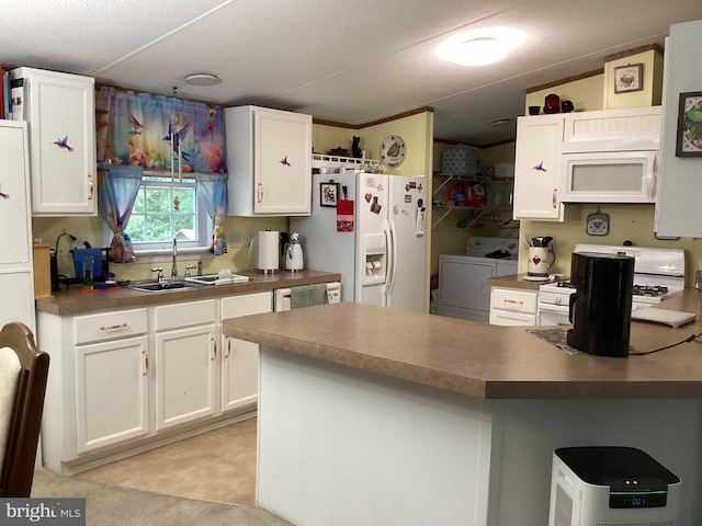 4041 Conowingo Rd, Darlington, MD 21034 - kitchen featuring white appliances, independent washer and dryer, white cabinets, and a sink