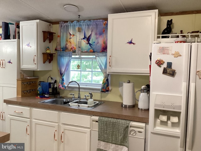 4041 Conowingo Rd, Darlington, MD 21034 - kitchen featuring white refrigerator with ice dispenser, a sink, white cabinets, and dark countertops