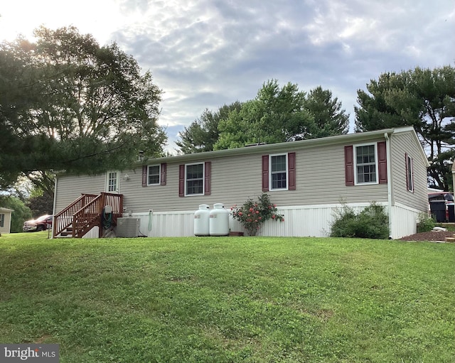 4041 Conowingo Rd, Darlington, MD 21034 - rear view of property with cooling unit and a lawn