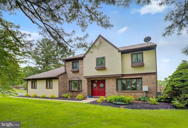 575 Millcross Rd, Lancaster, PA 17601 - view of front of house featuring brick siding and a front lawn