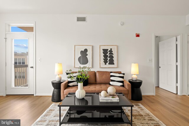 2001 12th St NW Unit 410, Washington, DC 20009 - living room featuring wood finished floors and baseboards