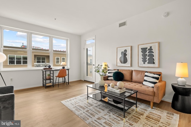 2001 12th St NW Unit 410, Washington, DC 20009 - living room featuring wood finished floors and baseboards
