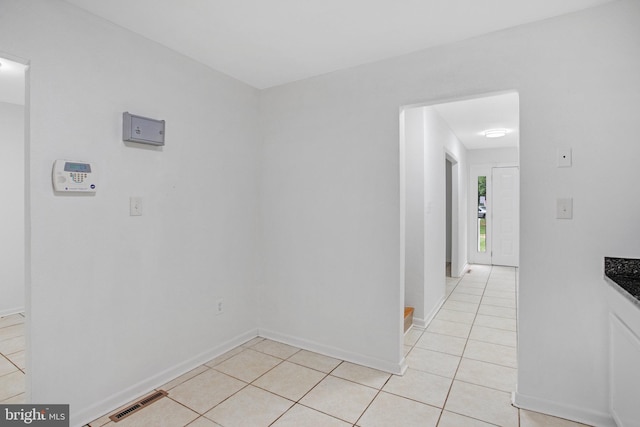 54 Austin Run Blvd, Stafford, VA 22554 - spare room with light tile patterned floors and baseboards