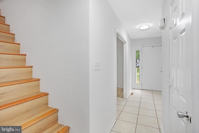 54 Austin Run Blvd, Stafford, VA 22554 - entryway with stairway, baseboards, and light tile patterned floors