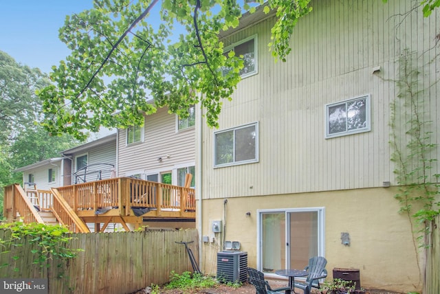 54 Austin Run Blvd, Stafford, VA 22554 - rear view of property with a deck and central AC unit