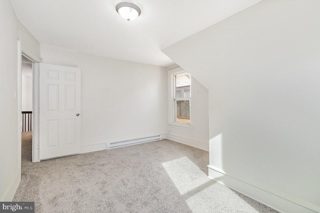 2405 N 5th St, Harrisburg, PA 17110 - additional living space with a baseboard radiator, carpet flooring, and baseboards