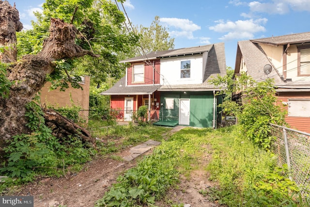 2405 N 5th St, Harrisburg, PA 17110 - back of house with fence and roof with shingles