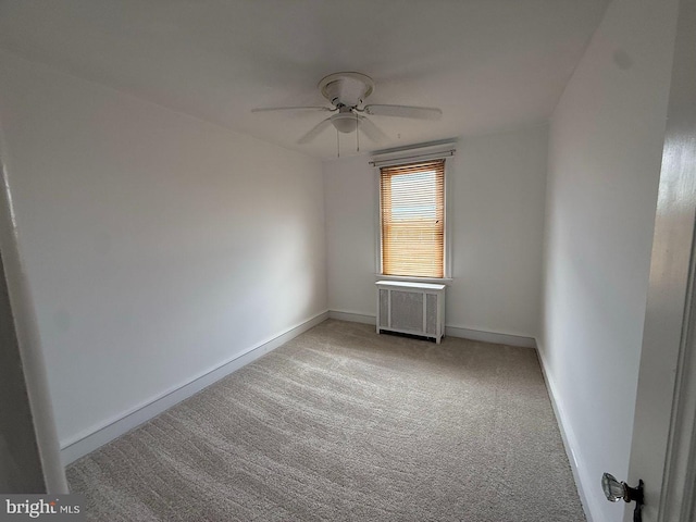 5902 E Roosevelt Blvd, Philadelphia, PA 19149 - unfurnished room featuring radiator, light carpet, ceiling fan, and baseboards