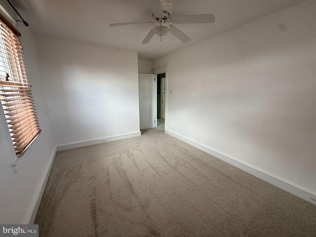 5902 E Roosevelt Blvd, Philadelphia, PA 19149 - unfurnished room with carpet floors, baseboards, and a ceiling fan