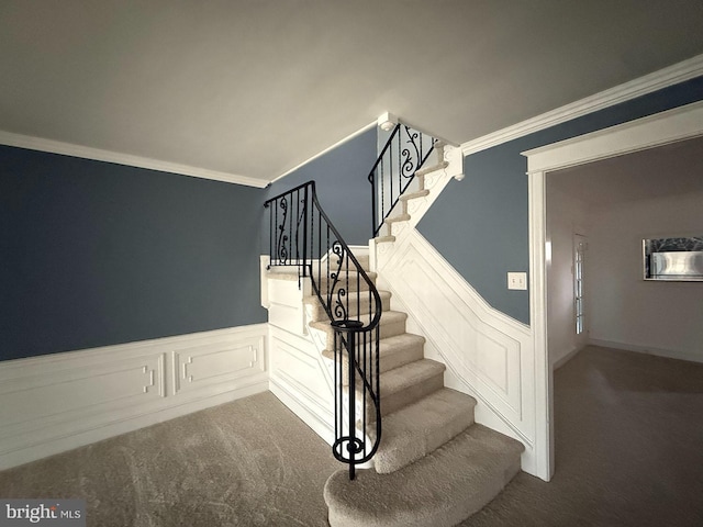 5902 E Roosevelt Blvd, Philadelphia, PA 19149 - stairway with carpet flooring, wainscoting, crown molding, and a decorative wall