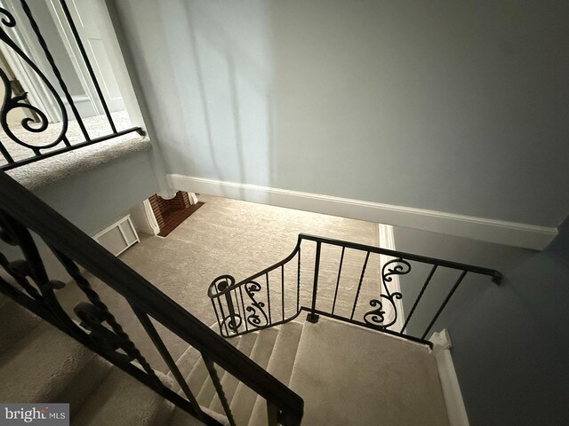 5902 E Roosevelt Blvd, Philadelphia, PA 19149 - stairway featuring carpet flooring and baseboards