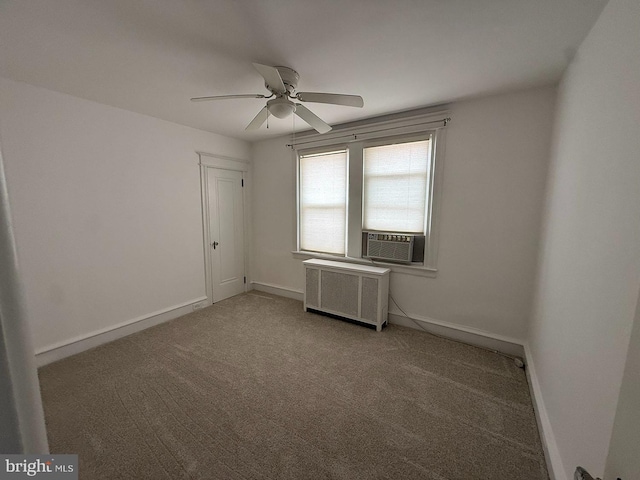 5902 E Roosevelt Blvd, Philadelphia, PA 19149 - carpeted empty room featuring radiator heating unit, cooling unit, ceiling fan, and baseboards