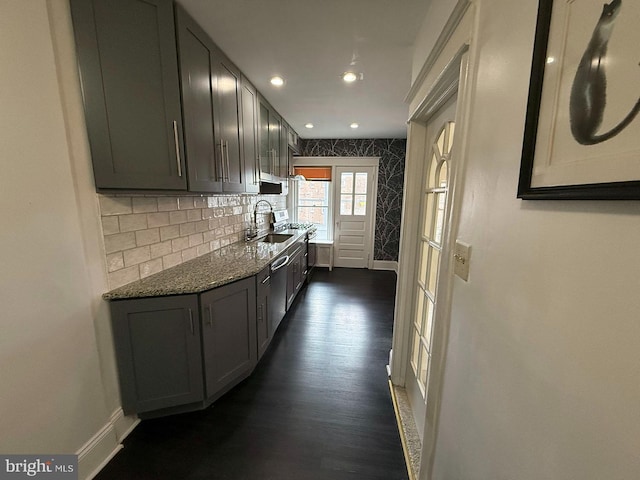 5902 E Roosevelt Blvd, Philadelphia, PA 19149 - kitchen with baseboards, stainless steel dishwasher, dark wood-style floors, tasteful backsplash, and recessed lighting