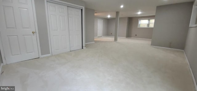 basement with carpet flooring, recessed lighting, and baseboards