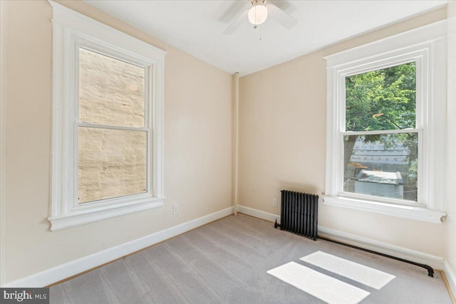 728 13th St SE, Washington, DC 20003 - carpeted spare room featuring radiator heating unit and a ceiling fan