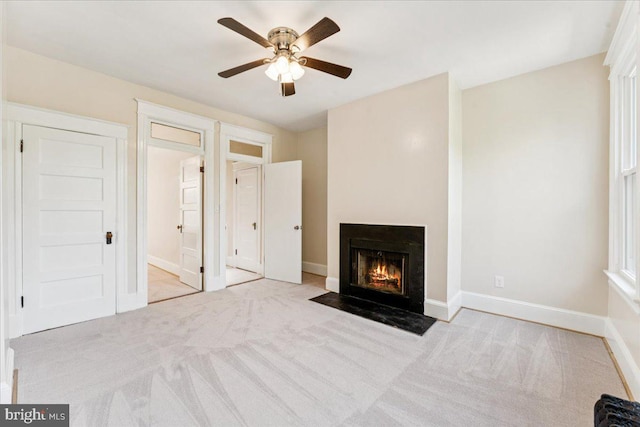 728 13th St SE, Washington, DC 20003 - unfurnished living room with carpet floors, ceiling fan, and a fireplace with flush hearth