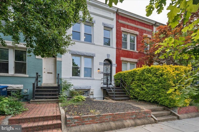 728 13th St SE, Washington, DC 20003 - townhome / multi-family property with brick siding and entry steps