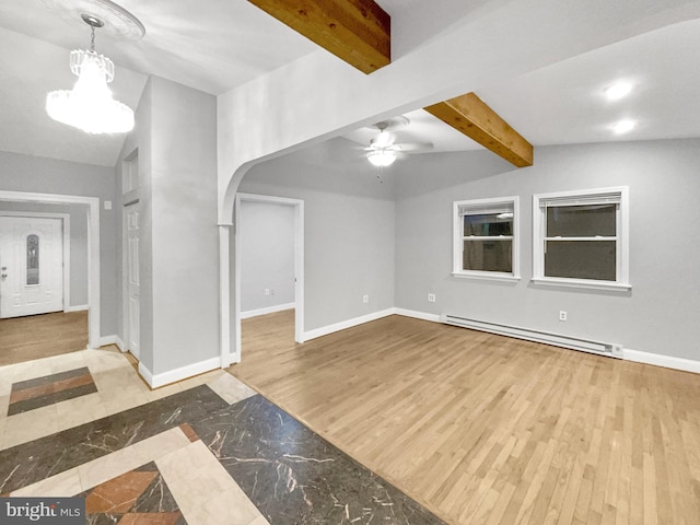 10811 Pearson St, Kensington, MD 20895 - entryway featuring a baseboard radiator, beamed ceiling, arched walkways, a ceiling fan, and baseboards