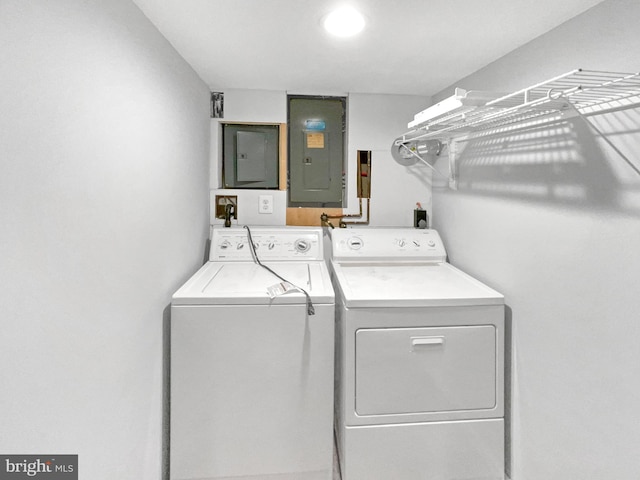 10811 Pearson St, Kensington, MD 20895 - laundry area with washer and dryer and electric panel