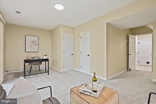 1205 Bond St, Herndon, VA 20170 - carpeted living room with baseboards and an office area