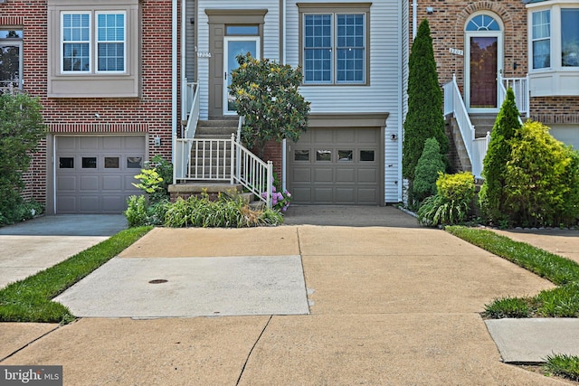 1205 Bond St, Herndon, VA 20170 - multi unit property featuring brick siding, driveway, and a garage