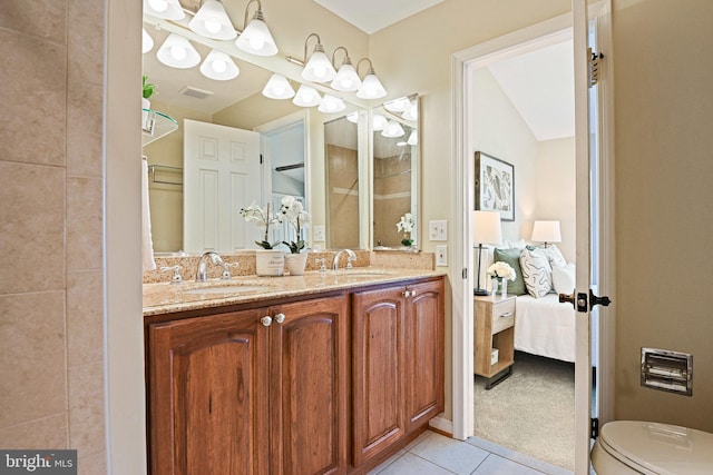 1205 Bond St, Herndon, VA 20170 - ensuite bathroom featuring tile patterned flooring, double vanity, and a shower