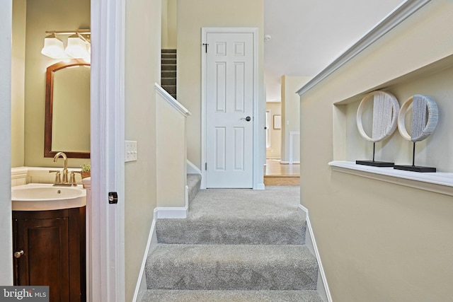 1205 Bond St, Herndon, VA 20170 - stairway featuring carpet floors and baseboards