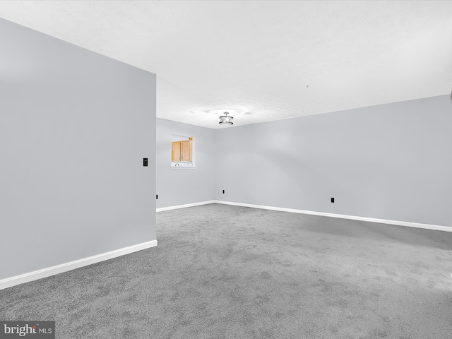 632 Island Creek Ct, Annapolis, MD 21401 - carpeted spare room with baseboards and a textured ceiling