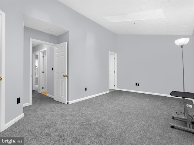 632 Island Creek Ct, Annapolis, MD 21401 - carpeted spare room featuring vaulted ceiling, baseboards, and a skylight