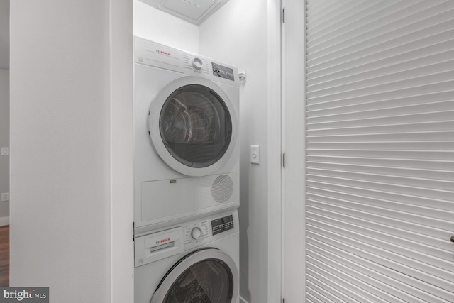 1300 4th St SE Unit 214, Washington, DC 20003 - washroom featuring stacked washer and clothes dryer