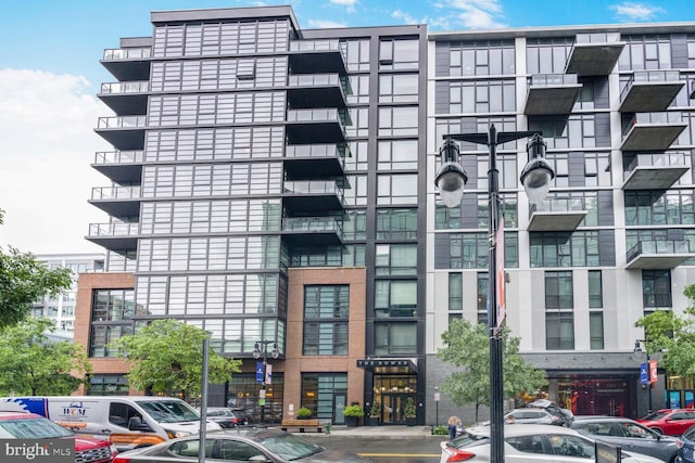 1300 4th St SE Unit 214, Washington, DC 20003 - view of building exterior featuring uncovered parking