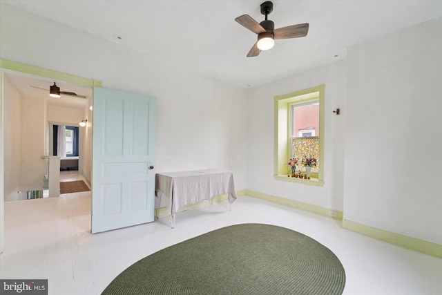 5811 Mcmahon St, Philadelphia, PA 19144 - unfurnished bedroom with multiple windows, a ceiling fan, and baseboards