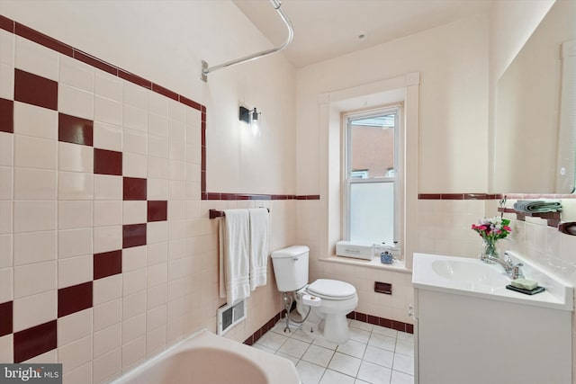 5811 Mcmahon St, Philadelphia, PA 19144 - full bathroom featuring tile walls, tile patterned flooring, a bathtub, toilet, and vanity