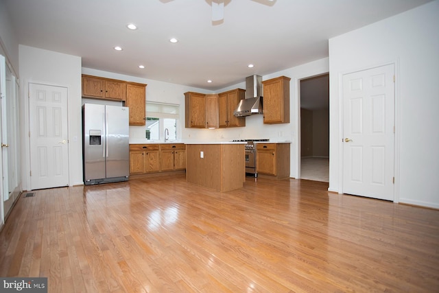 30 Dayton Cir, Fredericksburg, VA 22406 - kitchen featuring appliances with stainless steel finishes, wall chimney exhaust hood, a sink, brown cabinetry, and ceiling fan