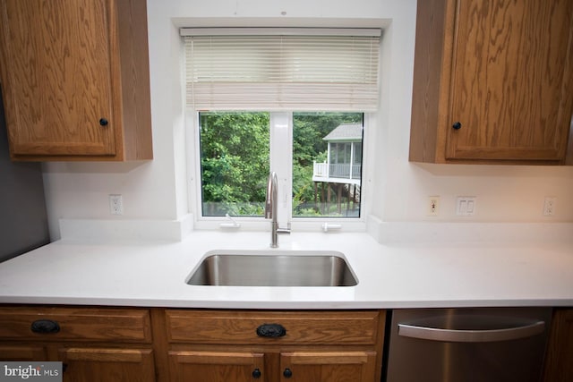 30 Dayton Cir, Fredericksburg, VA 22406 - kitchen featuring stainless steel dishwasher, a sink, light countertops, and brown cabinets