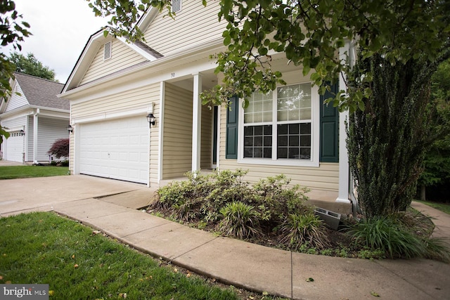 30 Dayton Cir, Fredericksburg, VA 22406 - view of front facade with concrete driveway and a garage