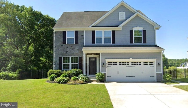 3615 Amber Way, Aberdeen, MD 21001 - view of front facade with a garage, stone siding, and concrete driveway