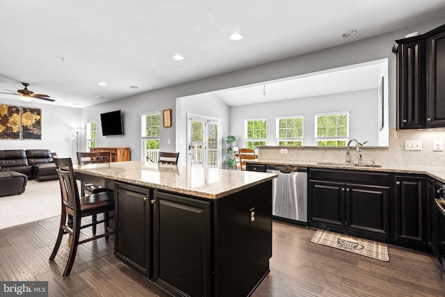 3615 Amber Way, Aberdeen, MD 21001 - kitchen featuring dishwasher, dark cabinetry, a sink, open floor plan, and dark wood finished floors
