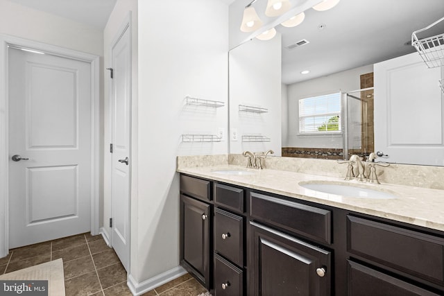 3615 Amber Way, Aberdeen, MD 21001 - full bathroom with a shower stall, double vanity, tile patterned flooring, and baseboards