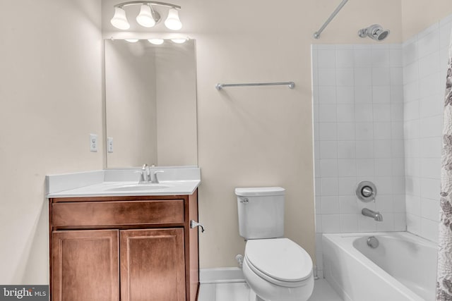 bathroom with toilet, vanity, and shower / tub combo with curtain