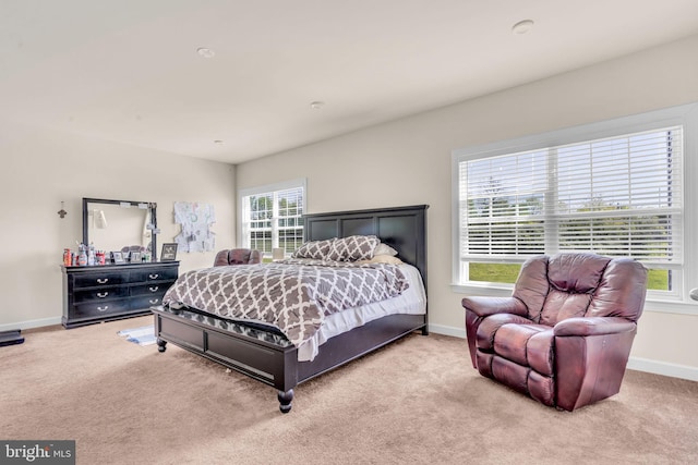 bedroom featuring carpet flooring and baseboards